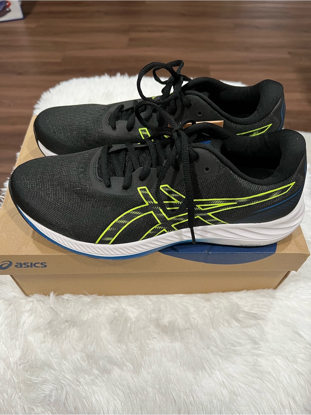 ASICS Black Running Shoes with Neon Yellow and Blue Accents
